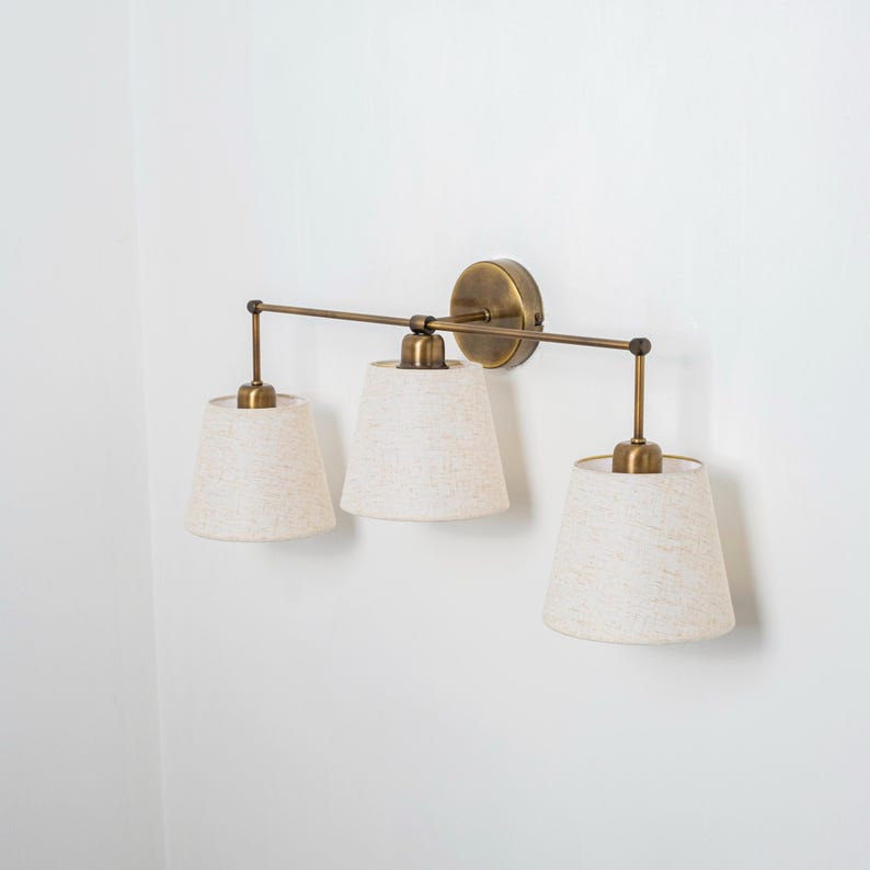 Château Brass Wall Sconce - Natural Linen Shades
