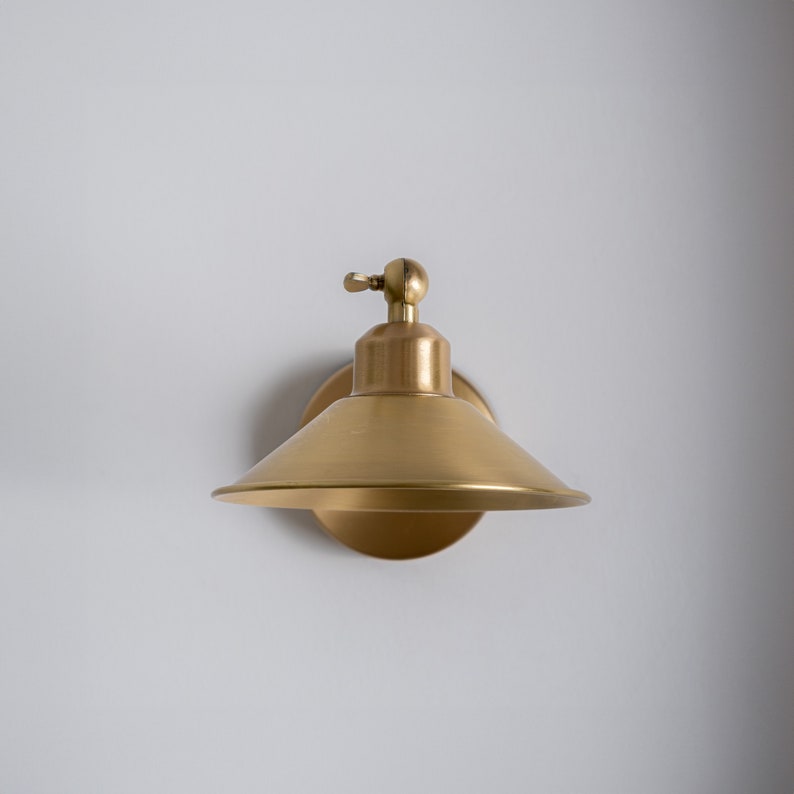 Aged Brass Swing Arm Sconce